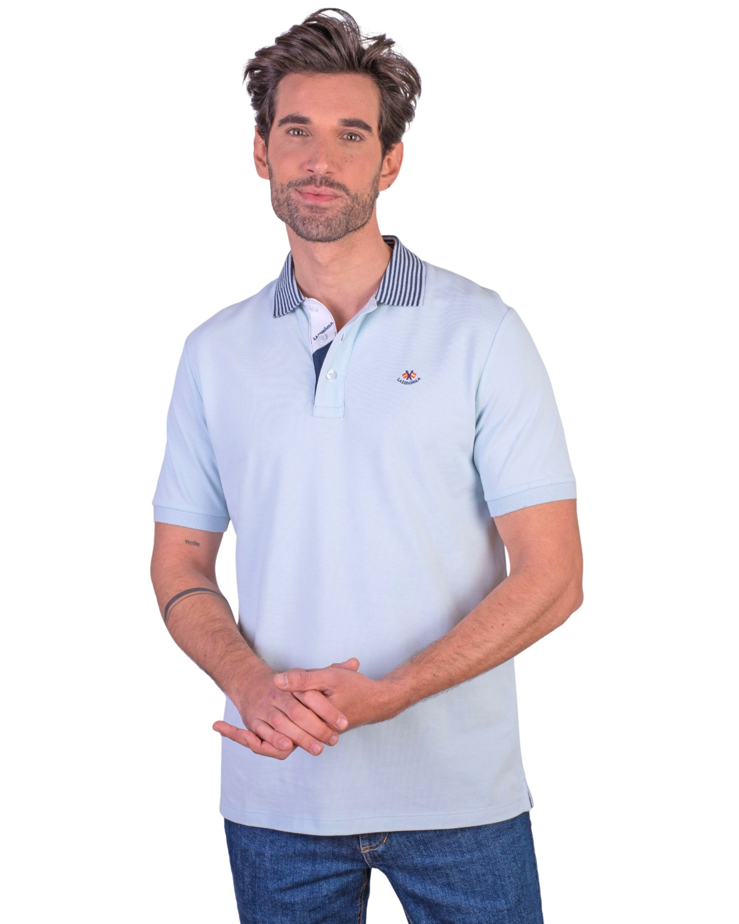 Serie 10953 Polo manga corta liso granito cuello combinado color celeste